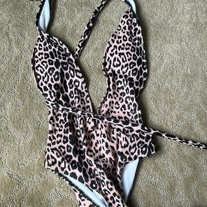 Leopard one piece, size small, never worn